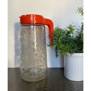 Retro Juice Tang Carafe with Red / Orange Lid and Etched Lilies